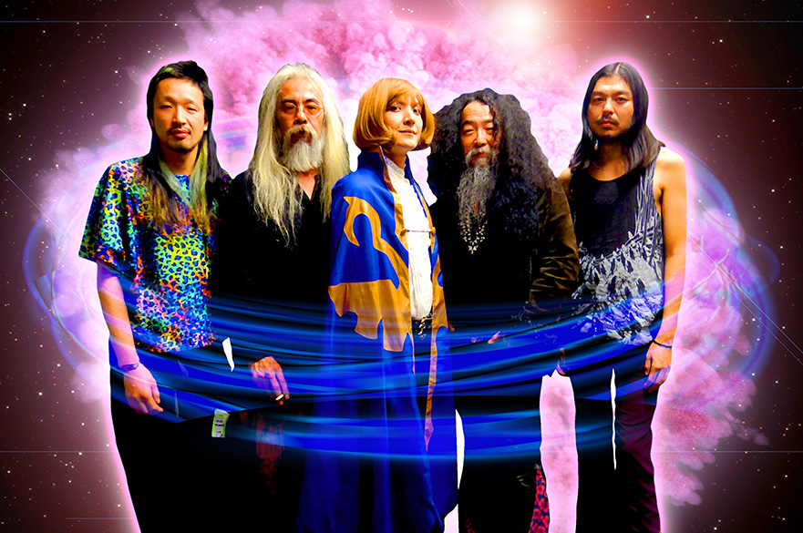 The band Acid Mothers Temple stood together with a cosmic background.