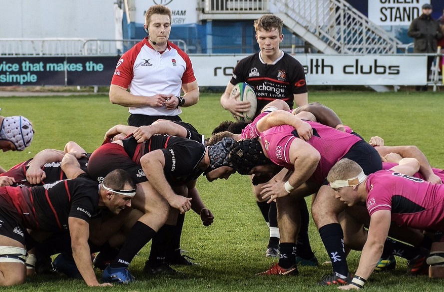 NTU Men's rugby union players in a scrum