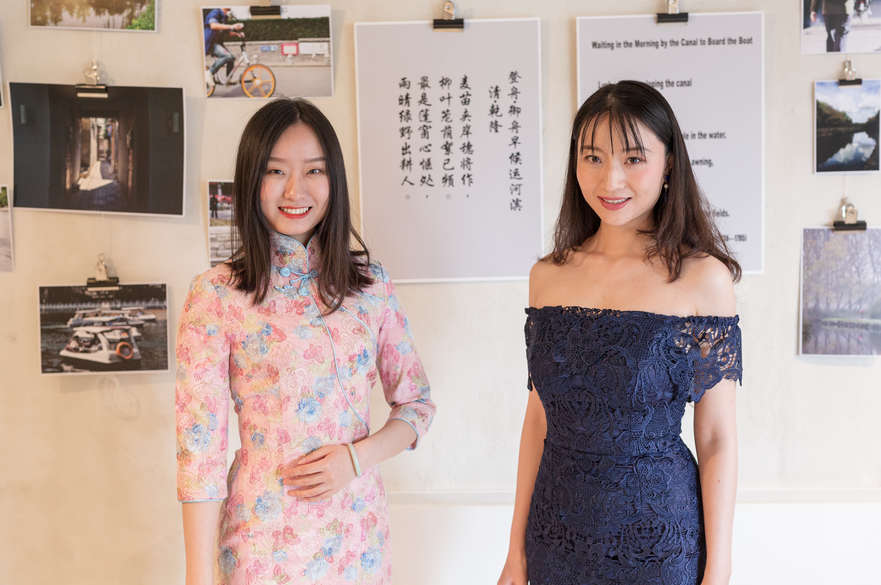 Two Chinese students performing poetry