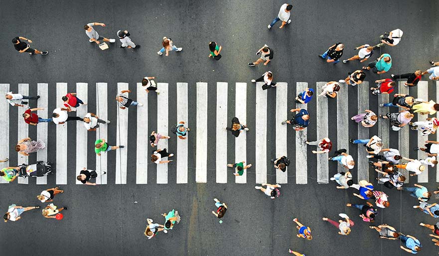 Aerial shot of people on a crossroads