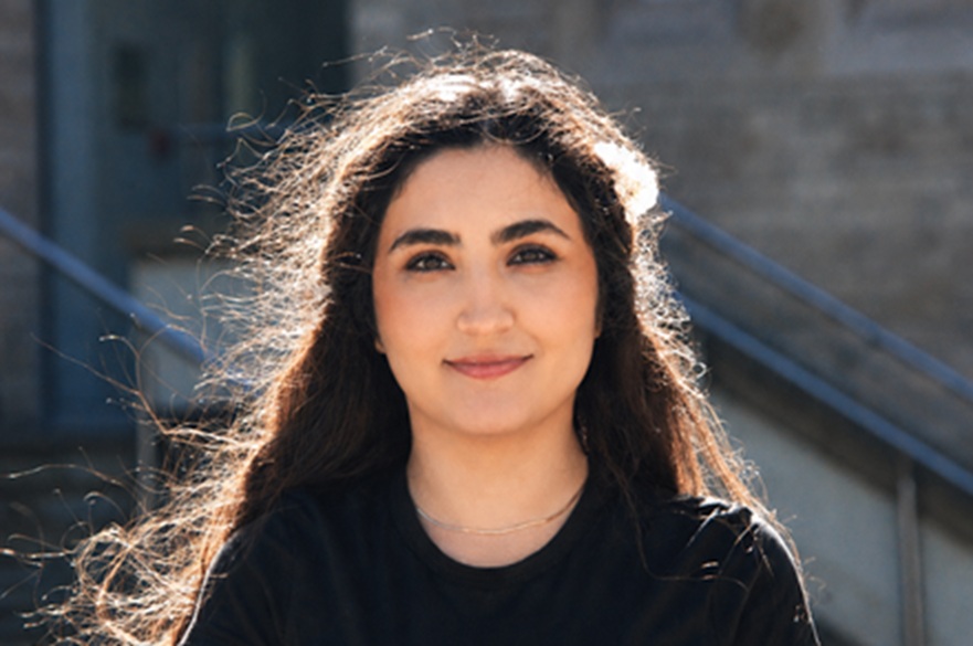 A person facing the camera, posed for a photograph.