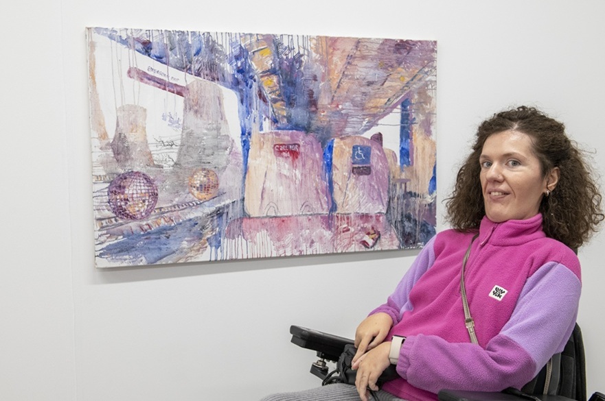 Hanna Litvinova with one of her artworks