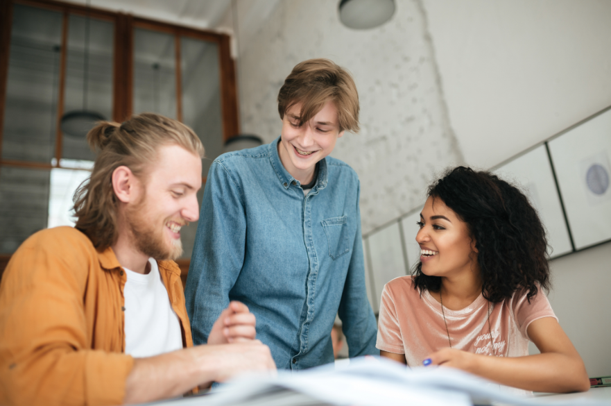 Young adults discussing a project