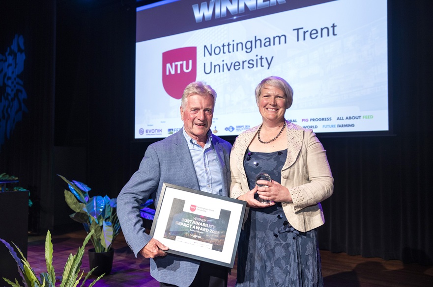 Professor Emily Burton and Professor Peter Williams collect the Sustainability Impact Award