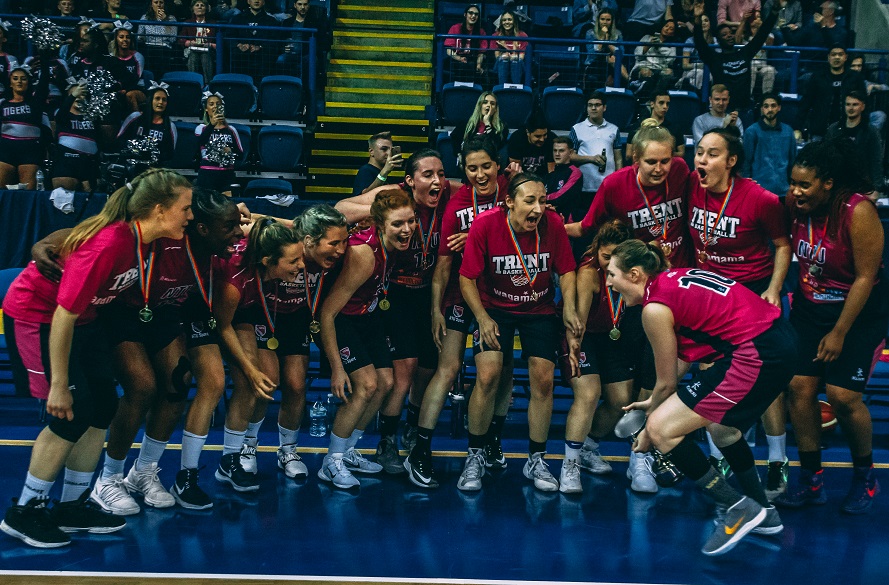 Women's basketball club celebrating