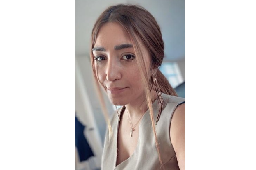A person facing the camera for a photo.