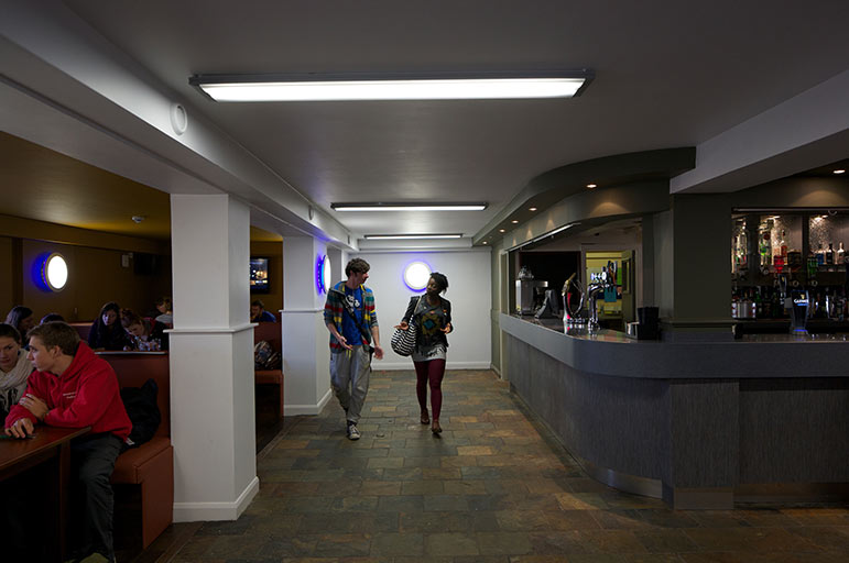 Two students walking at Clifton Students' Union