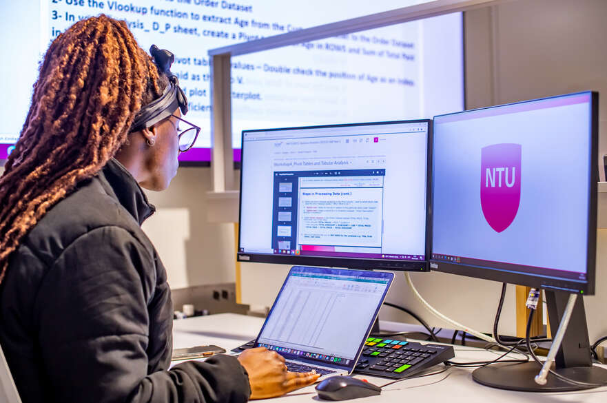 Researcher working at a desk