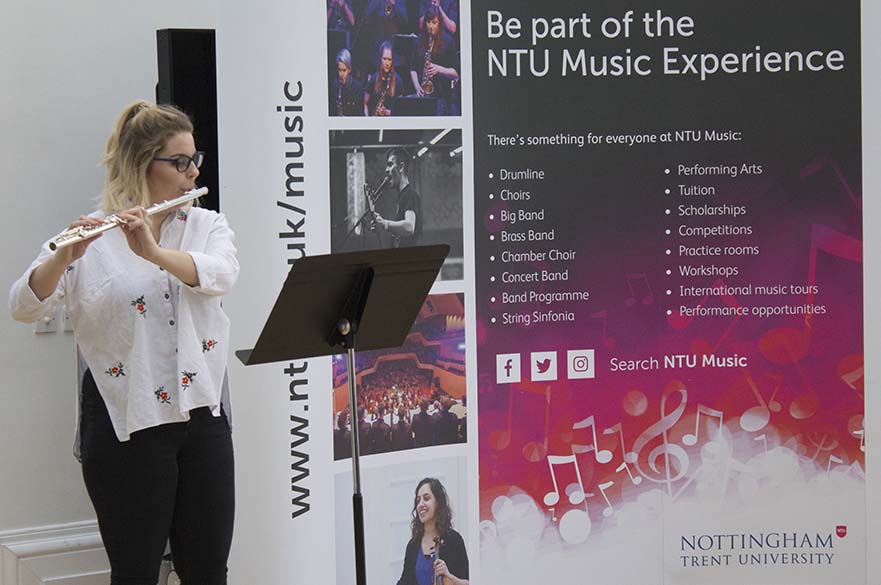 Female student playing the flute