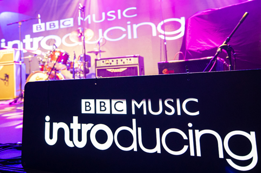 A photo of a stage with a BBC Music Introducing sign.
