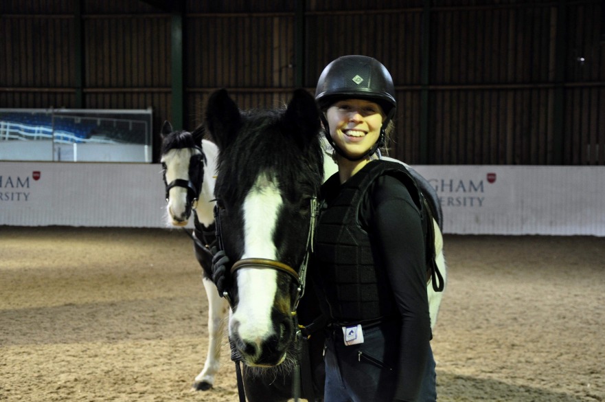 Chloe Tait with an NTU horse in a practical riding session