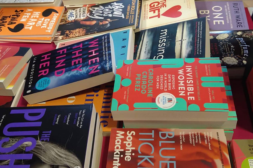 Books laid out on a table.