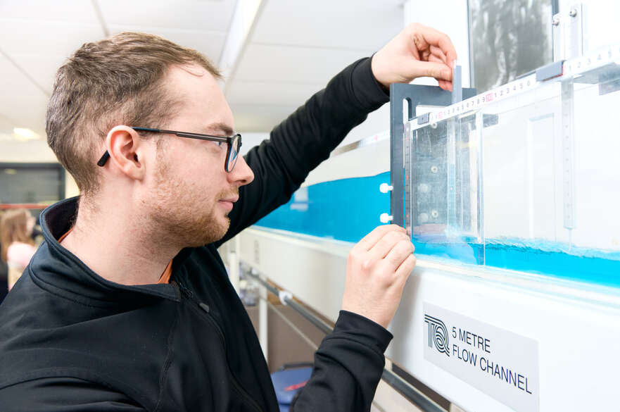 Student doing water flow testing