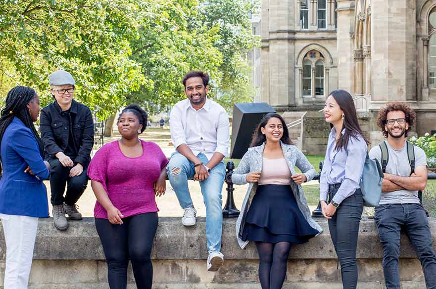 Group of students on wall