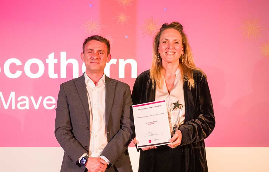 Anna Scothern receiving her award on stage