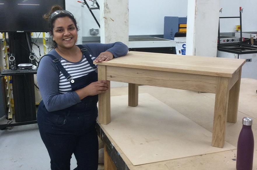 a student on NTU short course furniture making constructing a table out of solid oak