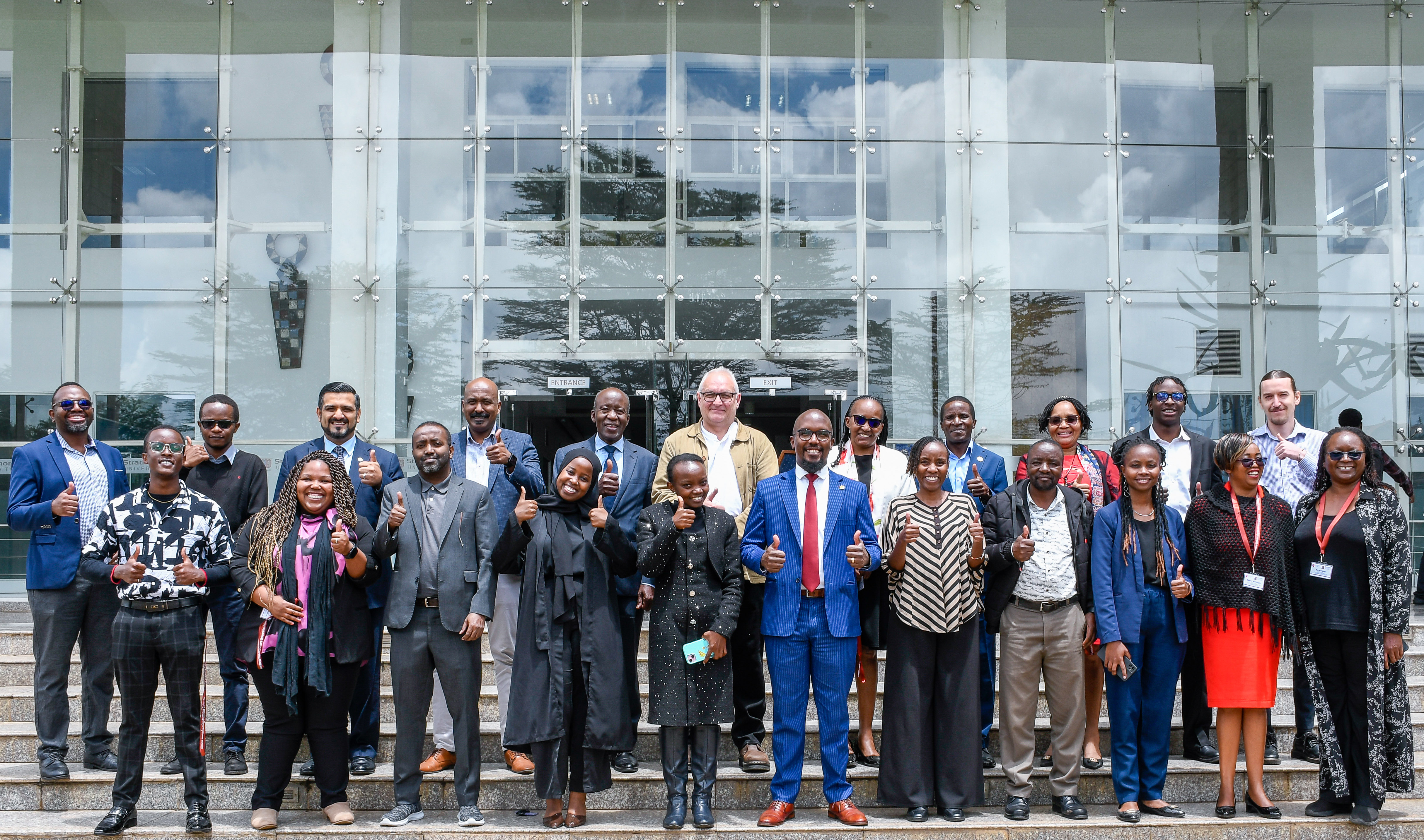 Group picture of delegates with NTU staff Dr Tarah Abdishakur and Prof Philip Wood at the first KEMI conference
