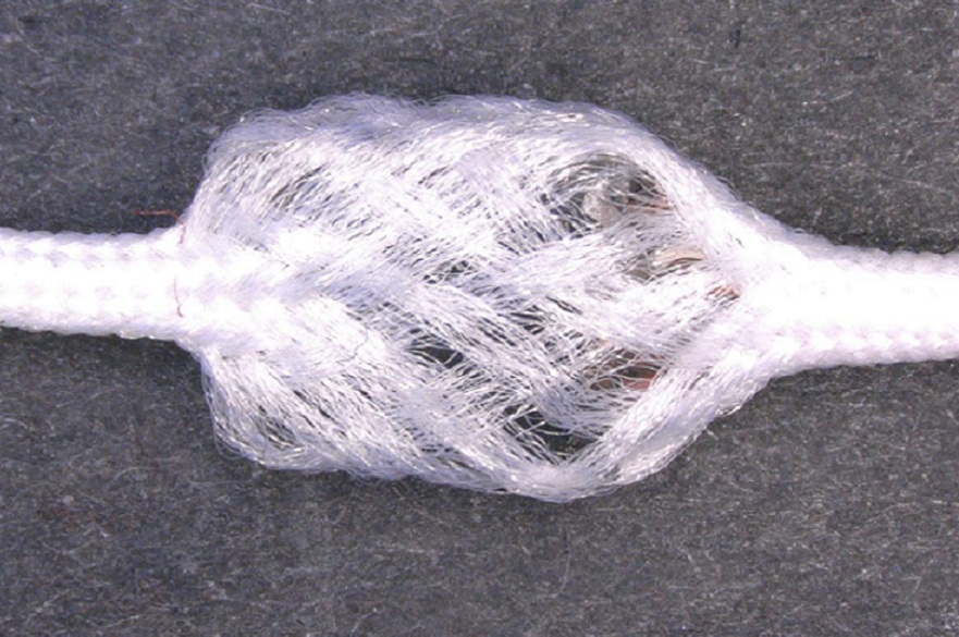 Motion sensor embedded in yarn