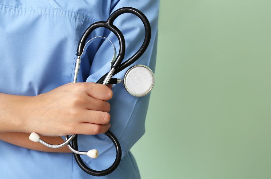 Torso of nurse in scrubs with stethoscope, Nottingham maternity Ockenden review