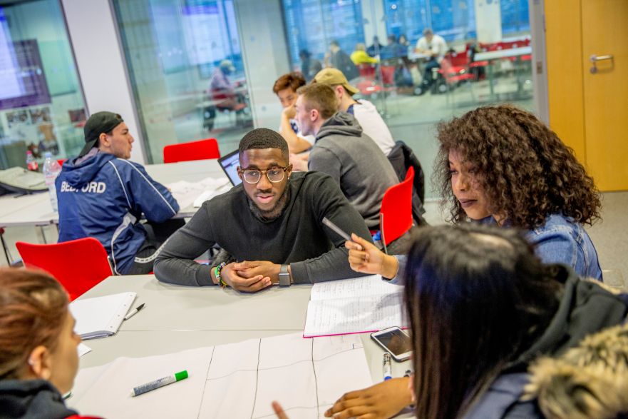 Image of students working in a classroom
