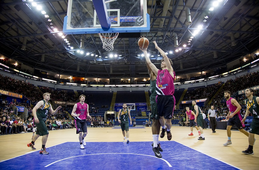NTU Men's Basketball player attempts a shot