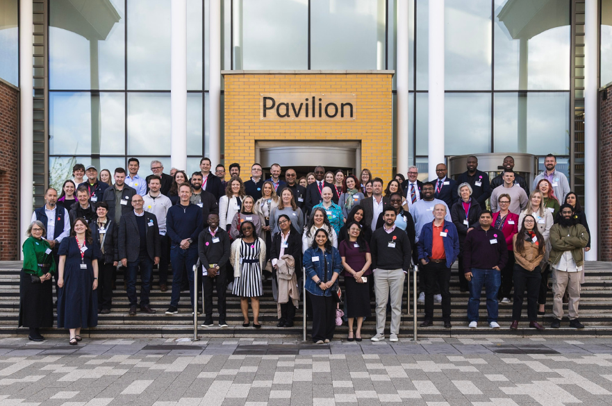 Alumni and Industry Fellows outside of the Pavilion building on Clifton campus
