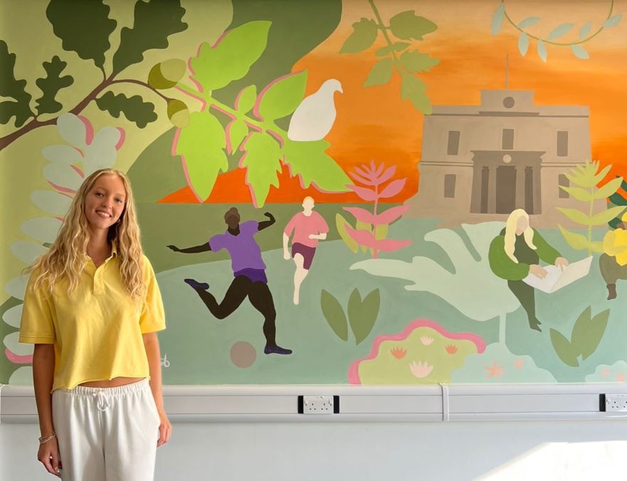 Maisie Froud in front of Mansfield Mural 