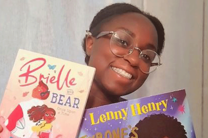 Salomey Doku with two books: Brielle and Bear and Tyrone's Cool Crown