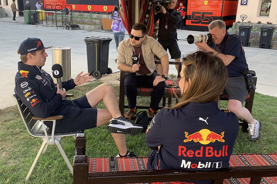 Christian Hewgill interviewing racing driver