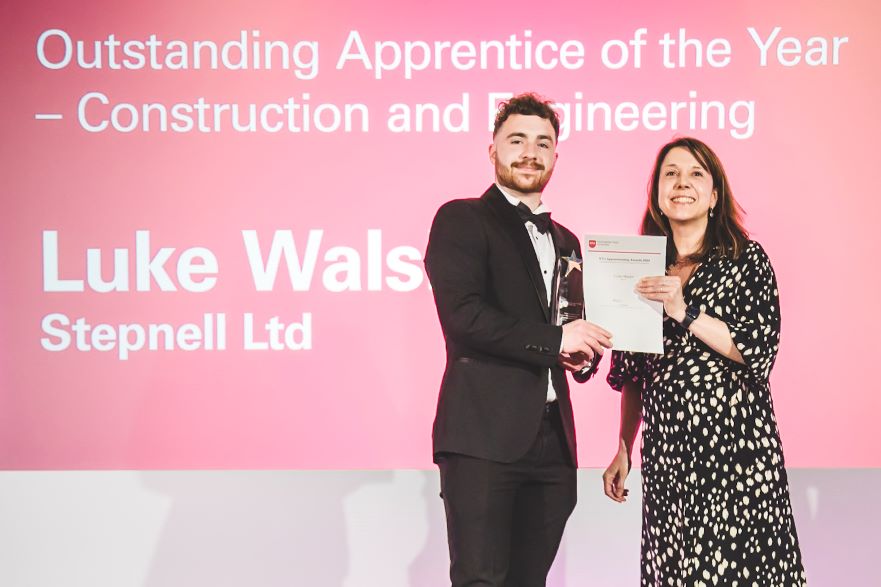 Luke Walsh receiving his award