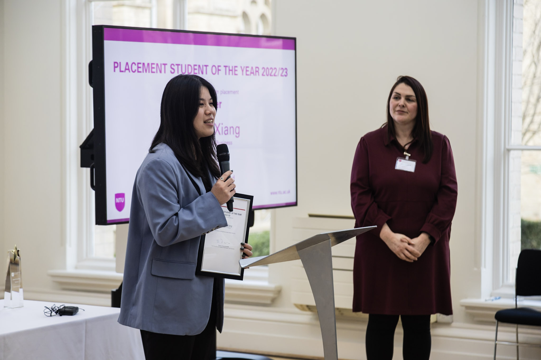 Sofia Ji Xiang receiving award