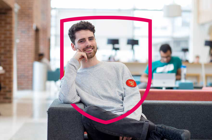 Student sat in the Pavillion building at Clifton Campus