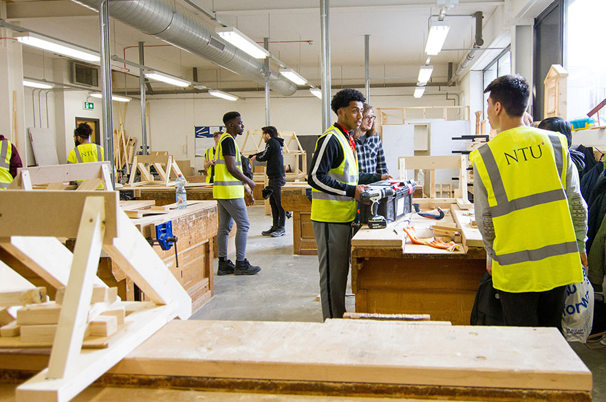 Architectural Technology students working during a trip to Basford Hall