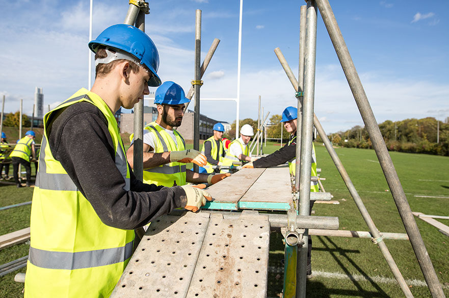 Civil engineering students from Nottingham Trent University on a bridge building exercise with construction company NMCN. 