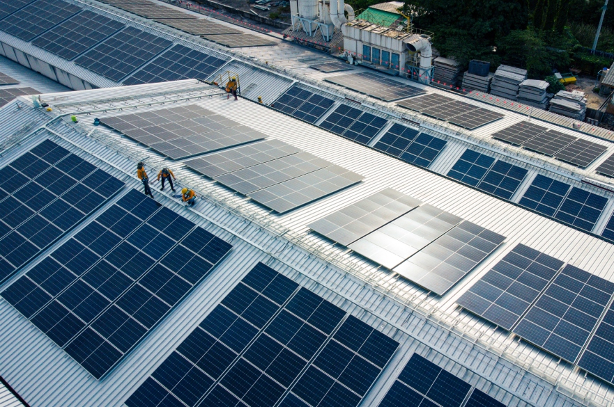 Solar panels on top of warehouse building