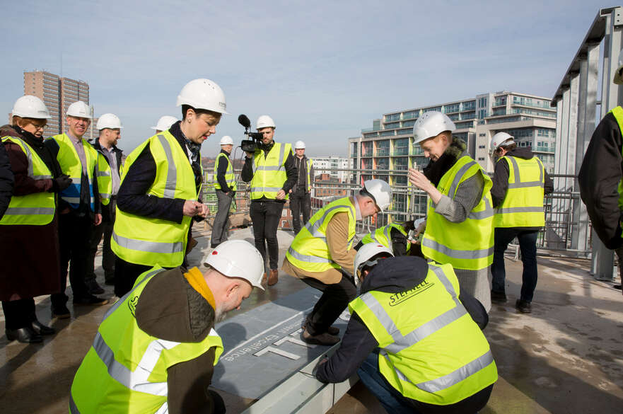 Students working on construction site