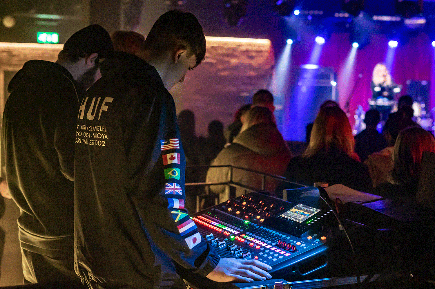 a student doing live sound for a gig