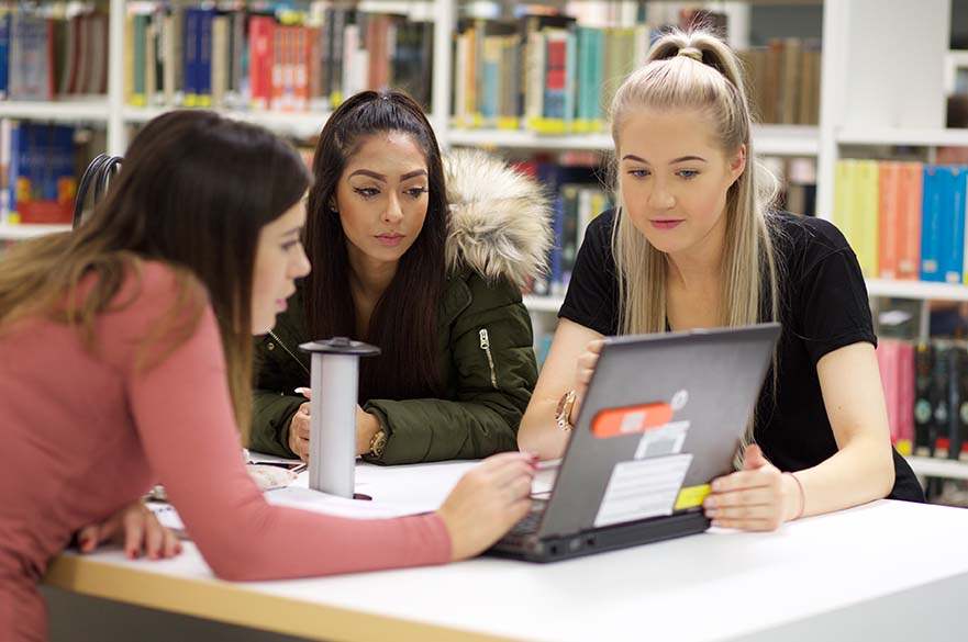 Students working on laptop