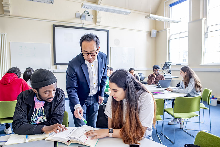 Teacher teaching English Language in classroom