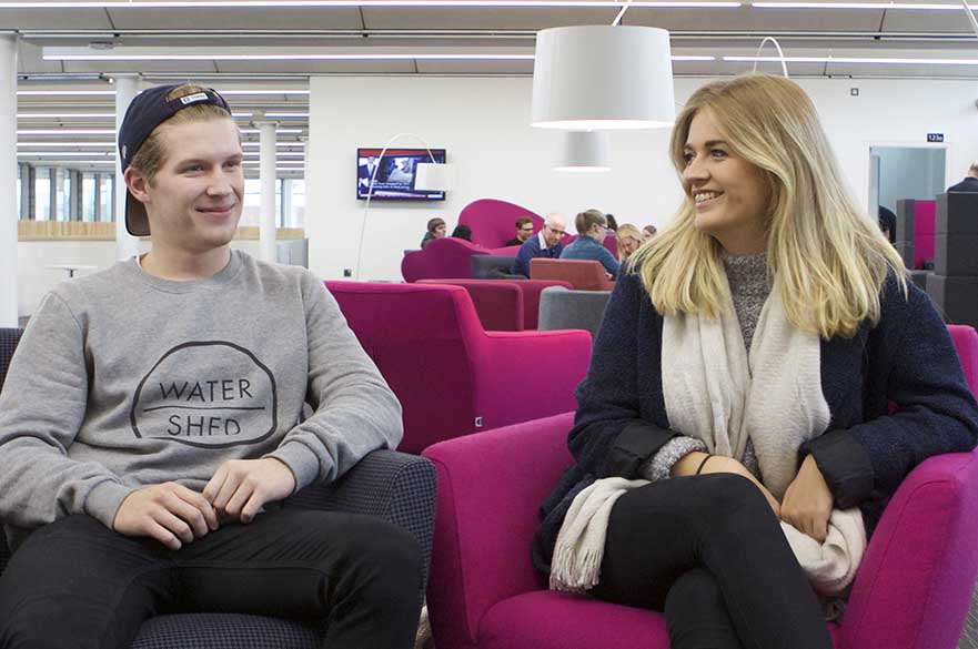 Students sat in lounge area