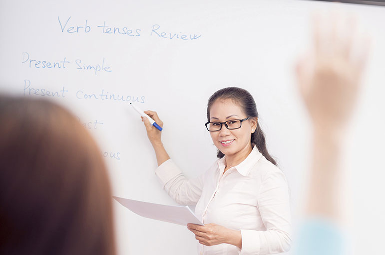 Teacher teaching verbs