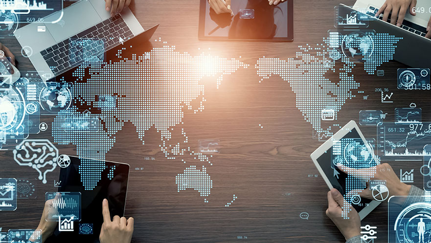 People working on global problem around desk