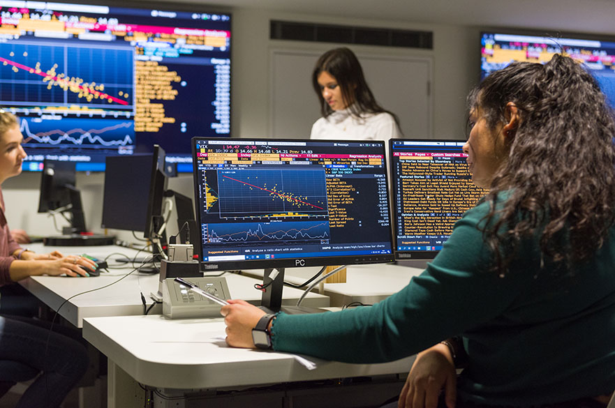 Student working on the Bloomberg terminals in the Nottingham Business School Business Lab on the City Campus at Nottingham Trent University