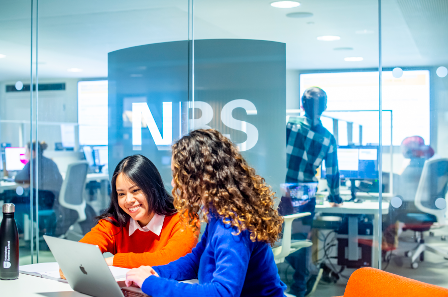 Two students studying in Newton