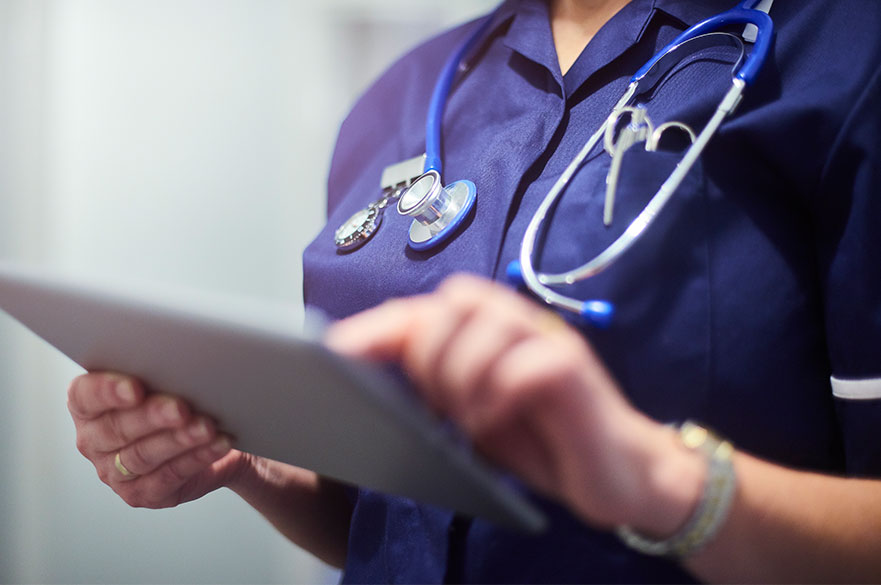 Nurse writing notes