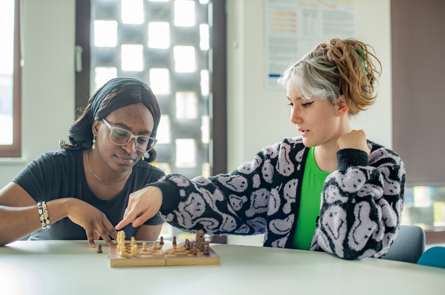 Two students playing chess