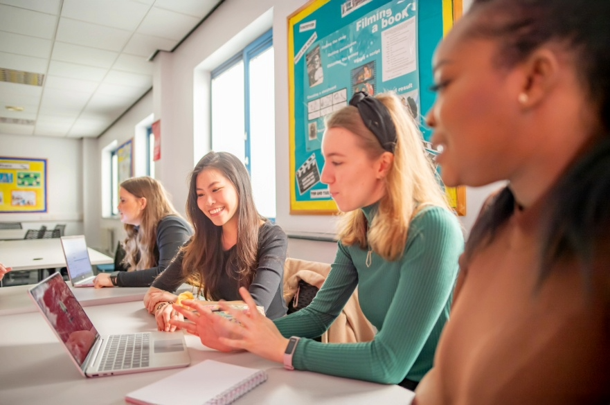 Students in a mock classroom on Clifton Campus