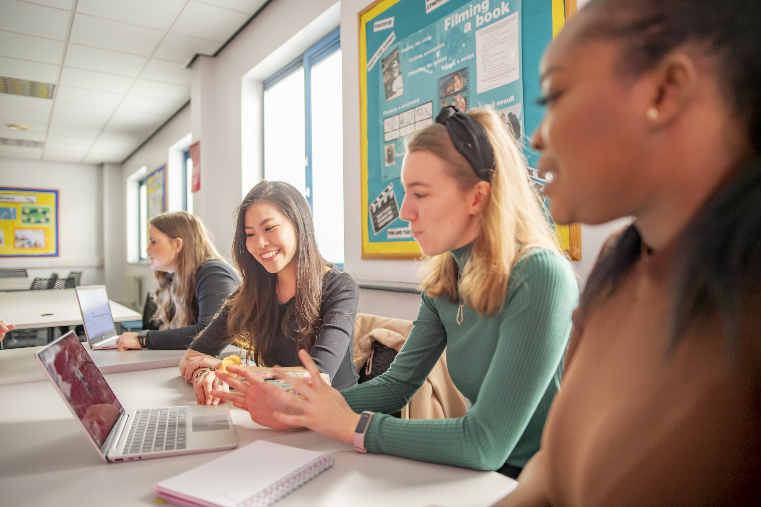 Students in a mock classroom on Clifton Campus
