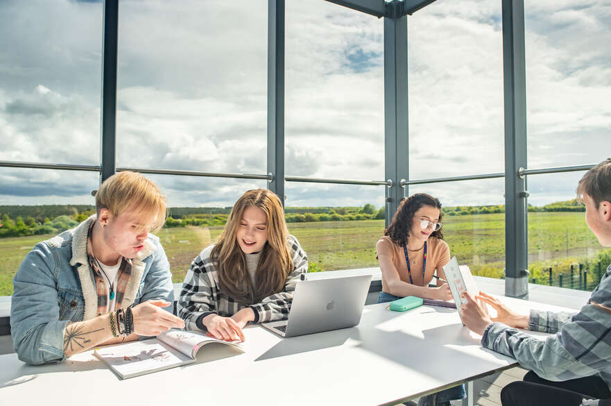 4 students studying at Mansfield roof terrace