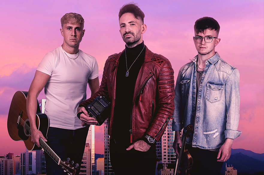 Image of 3 men again a pink cloudy sky holding instruments.